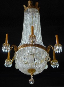 Antique gilt 6-arm electrified chandelier with swagged ropes of crystal beads and additional prism and teardrop crystals, est. $5,000-$7,000. Sterling Associates image